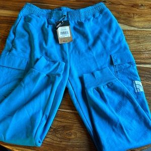 Men’s North Face jogger, large with pockets, white box logo. Concord/ teal